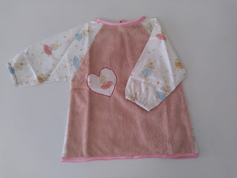 Bavoir tablier rose lapins danseurs 6/18 mois
