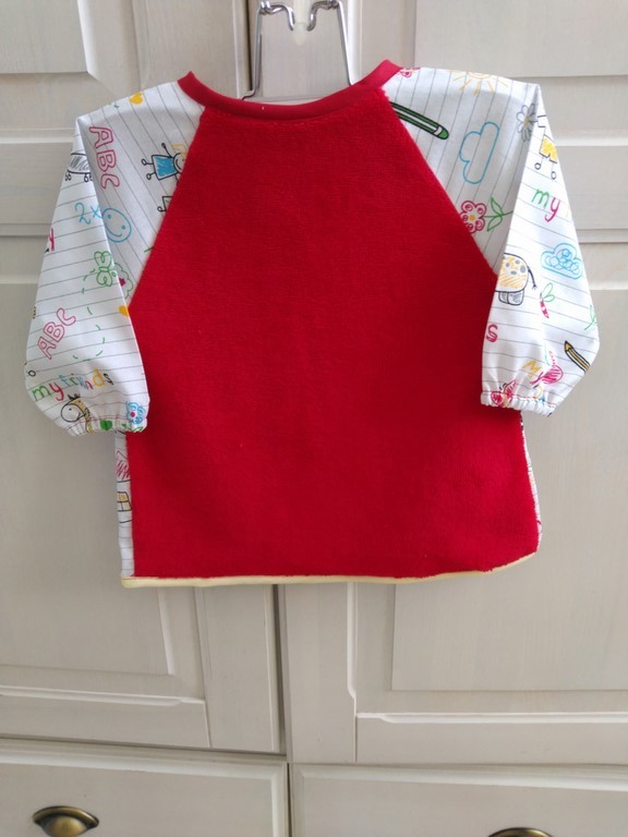 Bavoir tablier rouge imprimé cahier école 6/18 mois