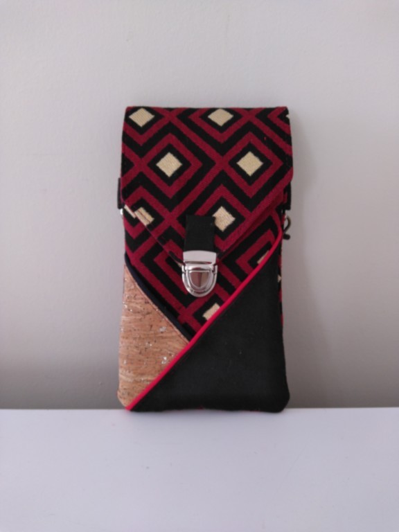 Pochette de téléphone noire, rouge et or