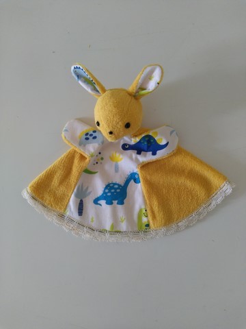 Doudou marionnette jaune, dinosaures
