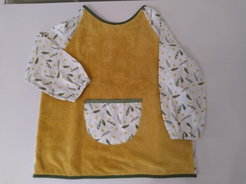 Bavoir tablier jaune et vert, imprimé plumes 2/5 ans