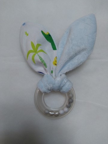 Hochet oreilles de lapin bleu, coton imprimé dinosaures