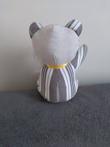 Nounours assis noeud jaune