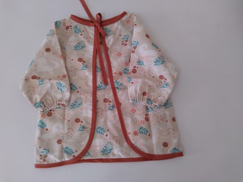 Bavoir tablier rose imprimé licornes 6/18 mois