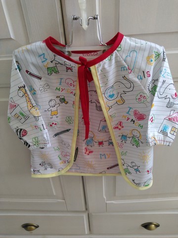 Bavoir tablier rouge imprimé cahier école 6/18 mois