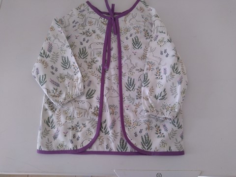 Bavoir tablier beige imprimé biches 2/5 ans