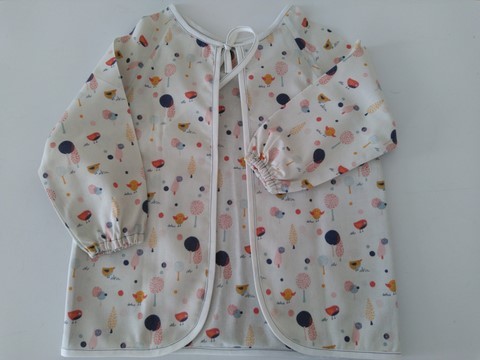 Bavoir tablier bleu imprimé poussins